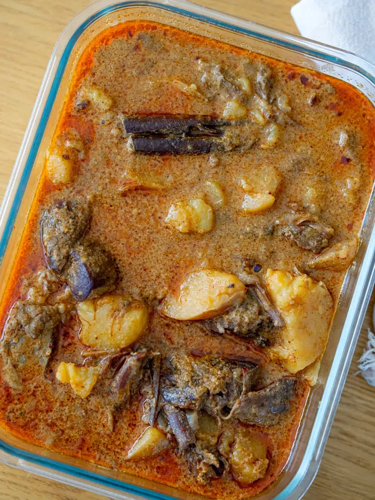 Massaman beef curry in a container, ready for the freezer – a freezer-friendly meal prep option