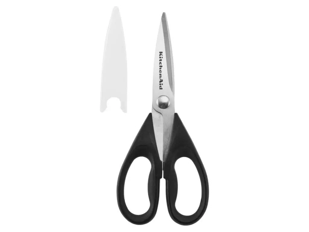 kitchen scissors with a protective cover.