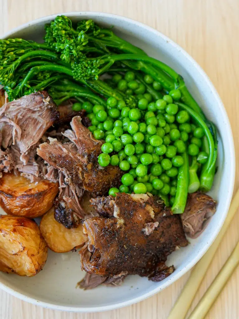 Close-up of Slow Cooker Lamb Shoulder showcasing the tender, well-seasoned meat and sauce