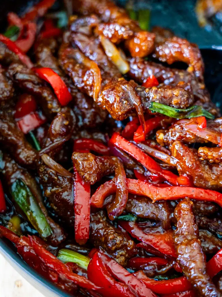 Top view of Sticky Rainbow Beef in a pan.
