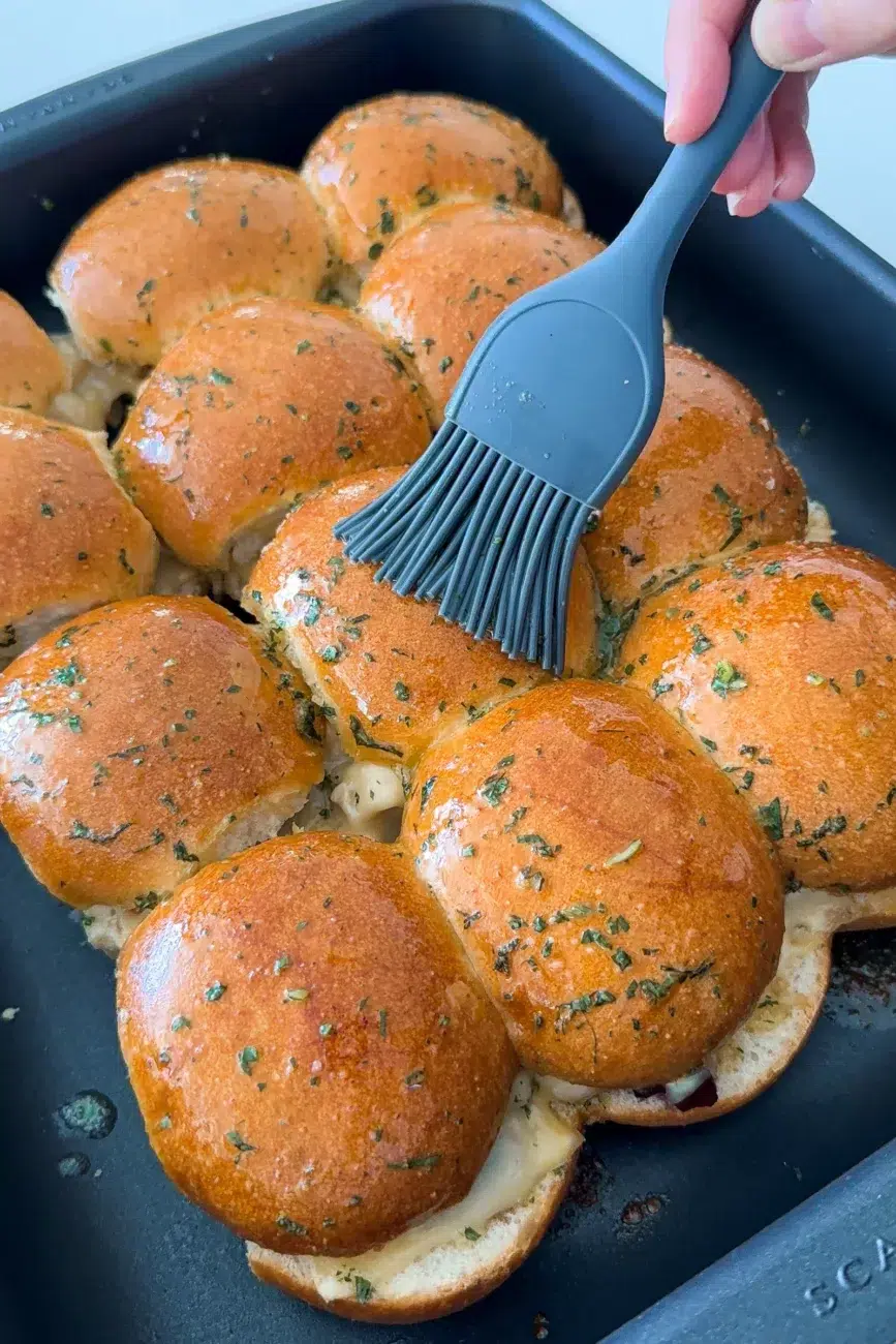 Butter Brushing Turkey Sliders