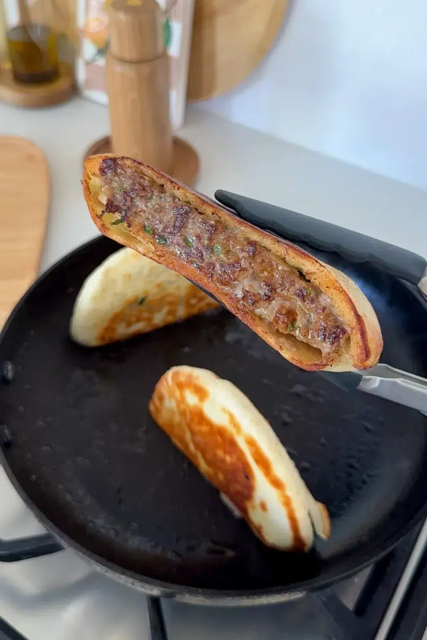 close up of cooked stuffed pita fresh out of the pan