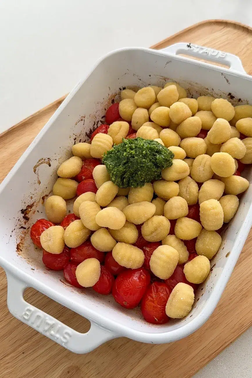 Fresh gnocchi and pesto added before mixing